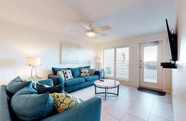 Fully Renovated Getaway with Beachfront Patio - Steps to Pool & Hot Tub