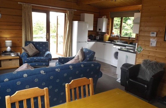 Hand built log cabin at Avonvale Holiday Lodges