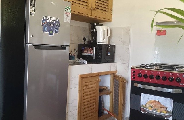 Hellenas Gem, an African themed and tranquil one bedroom house in Diani