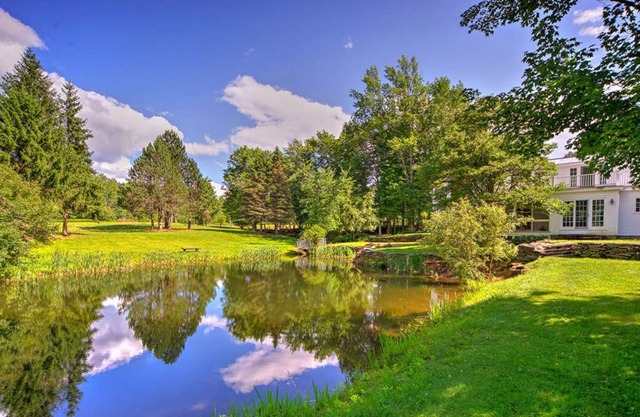 Historic waterfront farmhouse w/ private swimming pond, fireplace, & fast WiFi