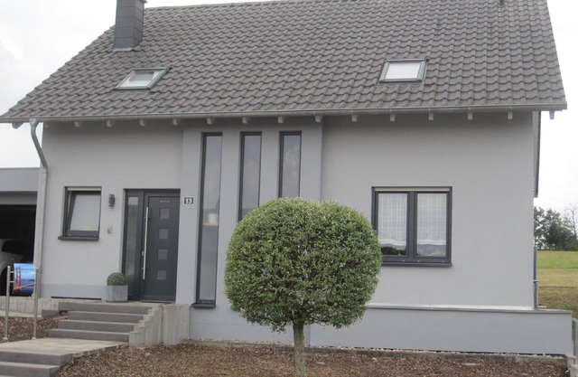 Holiday apartment with a terrace and a parking space, by the edge of the forest