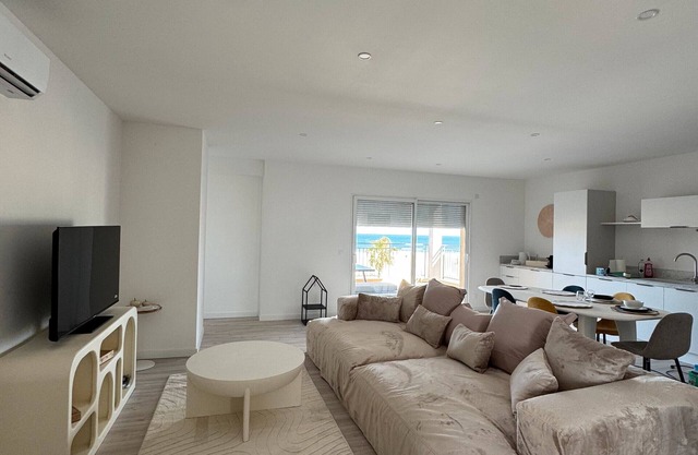 Holiday Home 'Face À La Mer 2' with Private Terrace and Air Conditioning