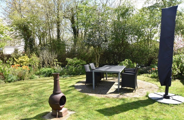 Holiday home with garden and barbecue