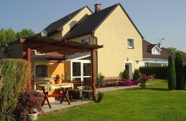 Holiday home with garden and pools