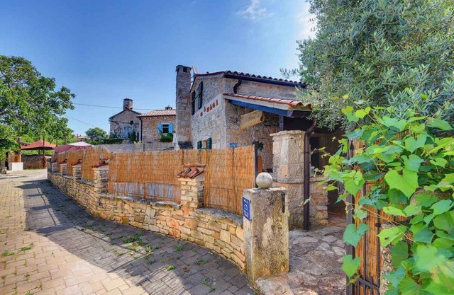 Holiday home with outdoor swimming pool