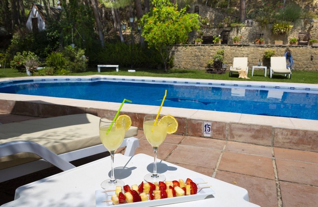 House with fireplace, large private gardens and swimming pool, Ronda, Spain.