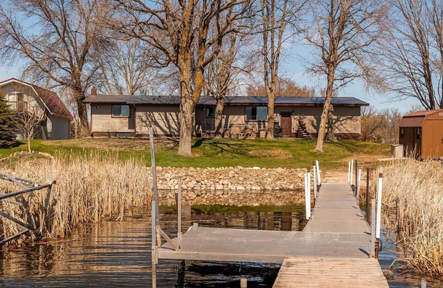 Ice fisherman. Snowmobilers Vehicle access to the lake from the property