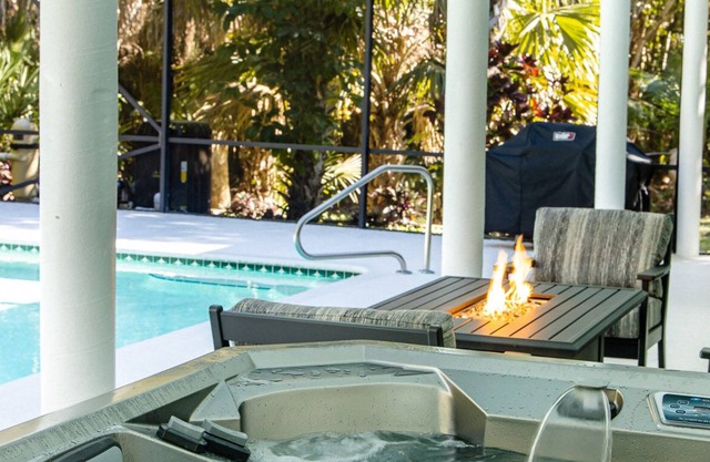 Jupiter. 2.5 serene and private acres. Surrounded by tropical landscaping.