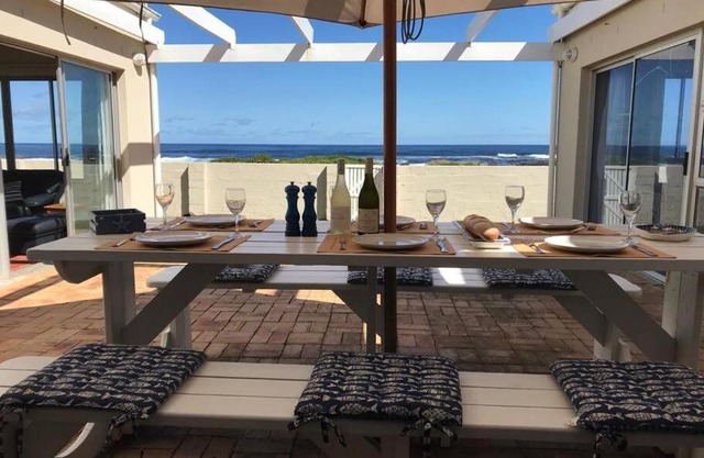 La Mer, a beautiful beachfront home in Sandbaai