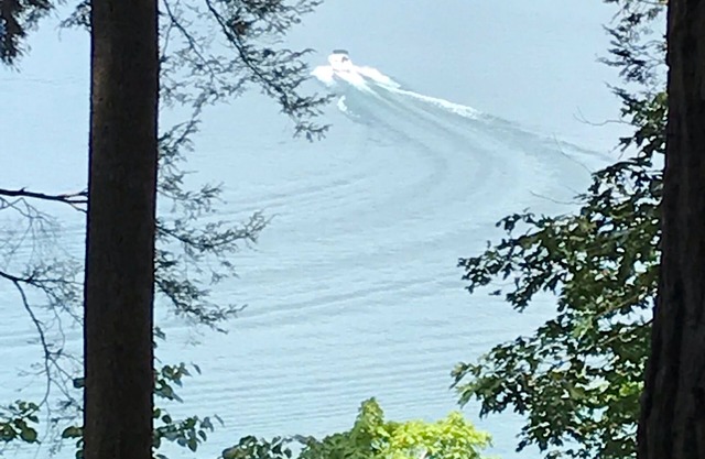 Lake Front Home with community boat ramp. Private, close to marinas and town.