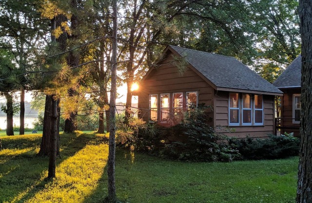 Lake Stella beautiful beach and spacious deck on quiet private drive.