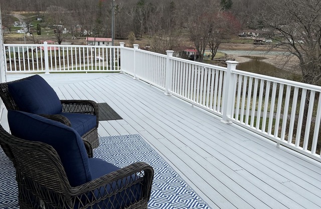 Lake Whitetail Cottage 3/2 with a carport & large back porch.