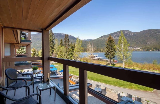 Lakefront condo w/mountain views & fireplace