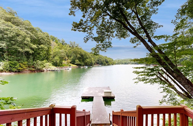 Lakefront home with mountain views, grill, firepit and dock