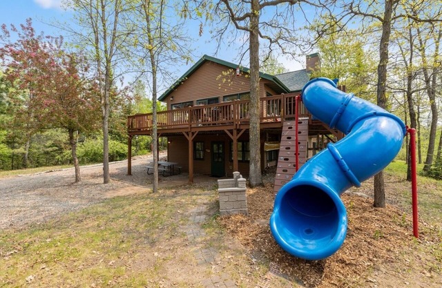 Lakefront retreat on Island Lake. Two cabins, 7 bedrooms, sand beach, privacy+