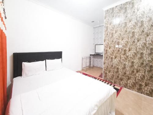 Lancar Homestay Syariah near BNS Mitra RedDoorz