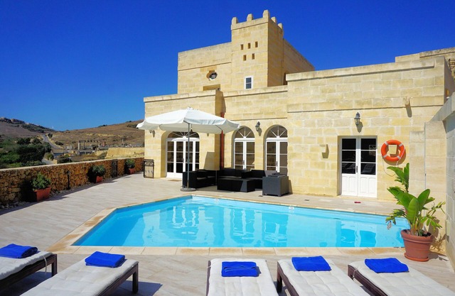 Large modern farmhouse with private pool & BBQ, stunning views, perfect location