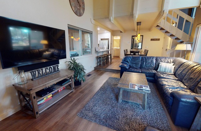 Lodge-Style Escape with A/C, BBQ & Walk to Spa