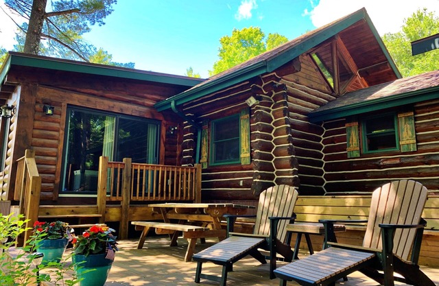 Log cabin on 19 mile Long Lake, large screen porch + dock, 1 acre mature pines