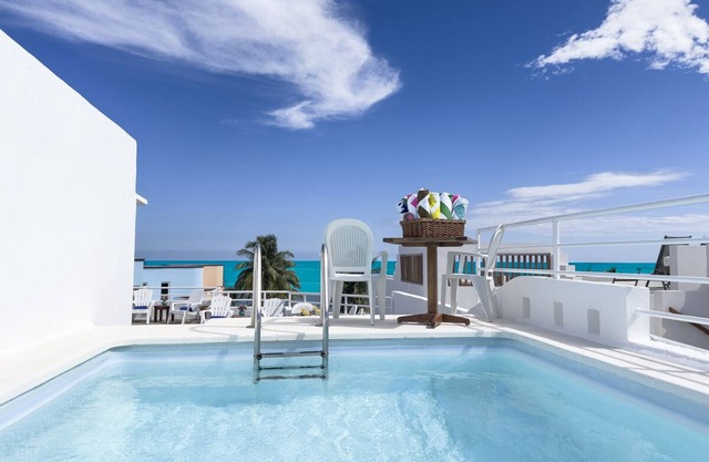 Lovely 5 bedroom home steps away from the beach
