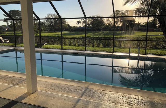 Lovely house overlooks golf course with west exposure delivery amazing sunsets.