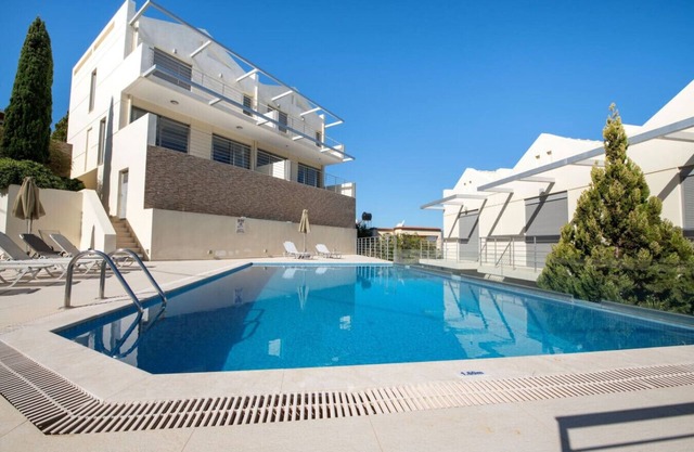 Lucky Seaside Villa - with a shared Pool by the beach