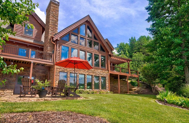 Luxe lakefront retreat with fishing dock, deck, firepit, patio & pool table