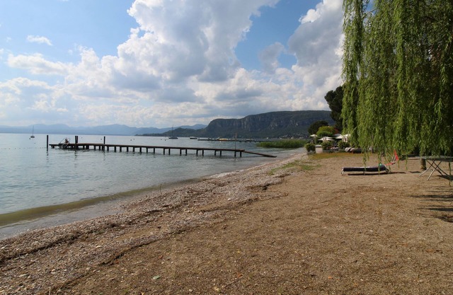 Luxurious lakeside apartment, private beach, lake view terrace