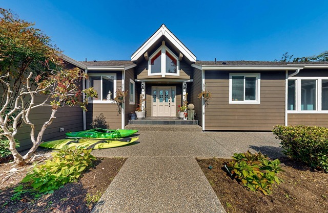 Luxurious water view home surrounded by wildlife and a private hot tub