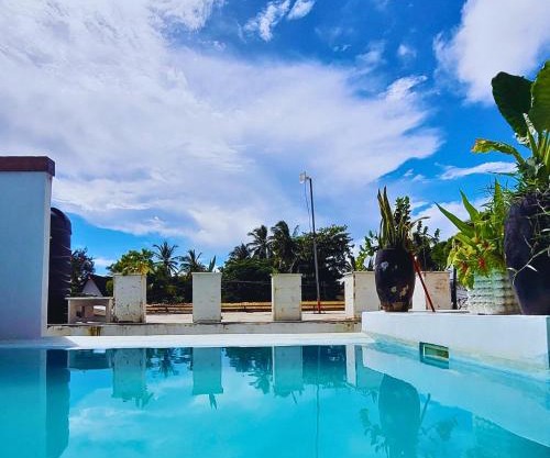 Luxury Penthouse with private rooftop pool prime location Paje Beach Zanzibar TV WIFI AC steps to the beach