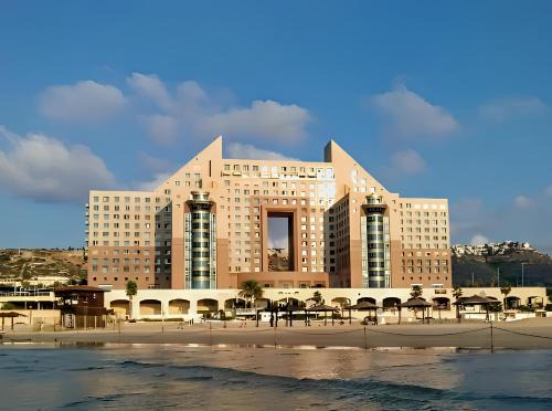 Luxury Penthouses with Jacuzzi for 8 people on the beach by Almog Beach Haifa Apartments