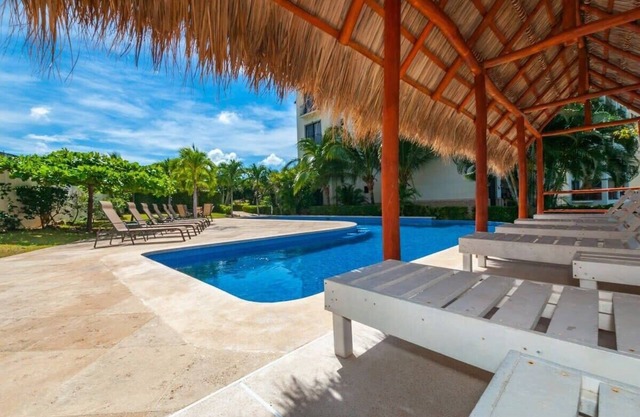 Luxury suite on 4th floor with pool and seemingly endless ocean views