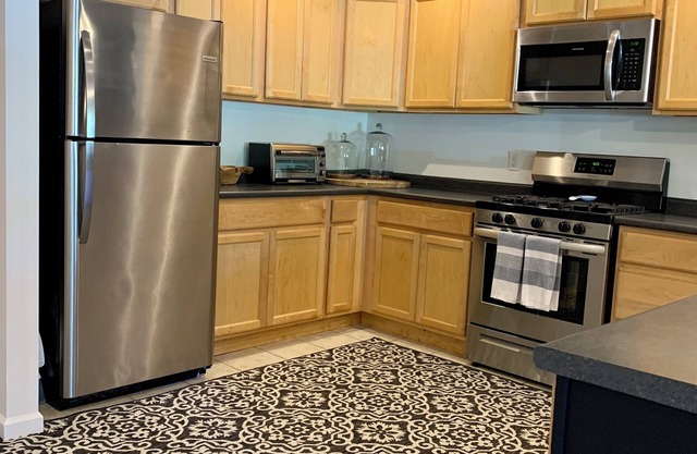 Millie’s apartment located at 4corners directly behindTom’s Doughnuts,Lake James