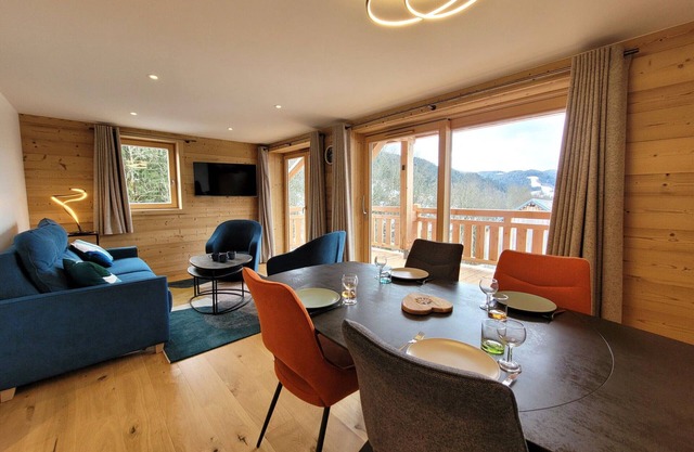 Modern Apartment with Sunlit Terrace, Close to Ski Slopes and Village Amenities