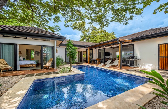 Modern home near the beach & stores with private pool, grill, patio, W/D, & AC
