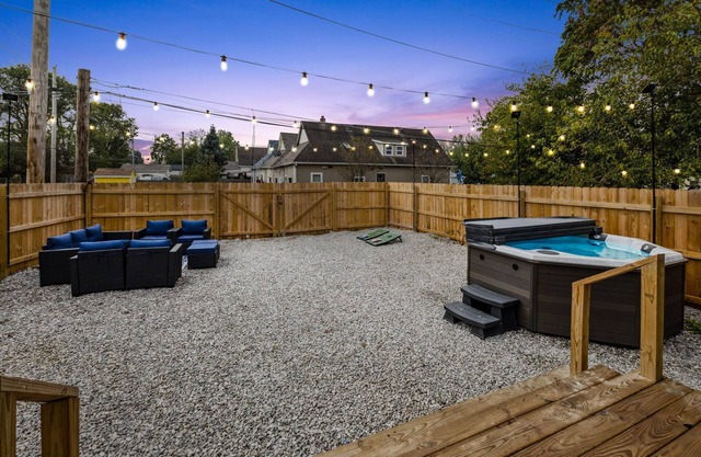 Modern Indy Retreat with Hot Tub, Outdoor Oasis, Prime location to Lucas Oil