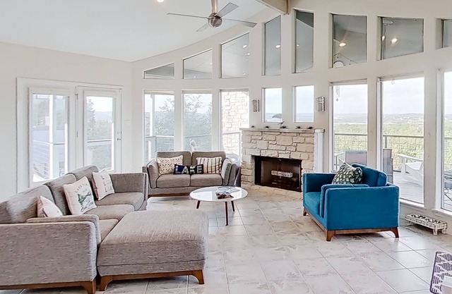 Modern lake-view retreat with balcony, deck, Peloton, central AC, & washer/dryer
