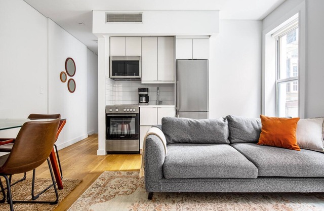 Modern Nolita 2BR w/W/D, large deck, easy walk to SoHo, by Blueground