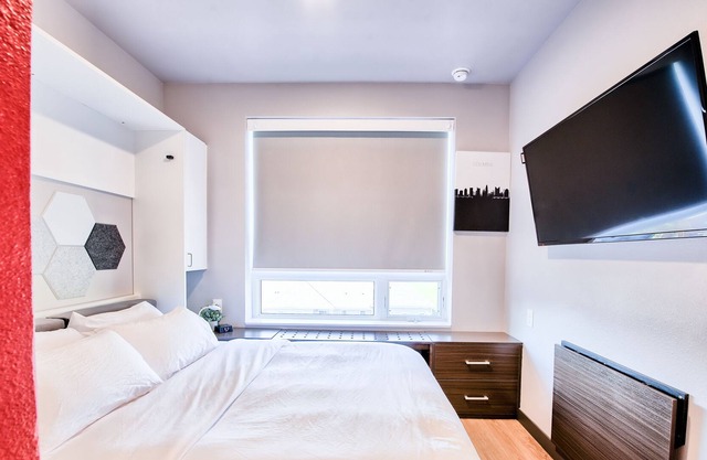 ⭐ Modern Tiny Studio 🌃 Free Parking, Hot Tub, Fitness Center, TV, WiFi, & More!