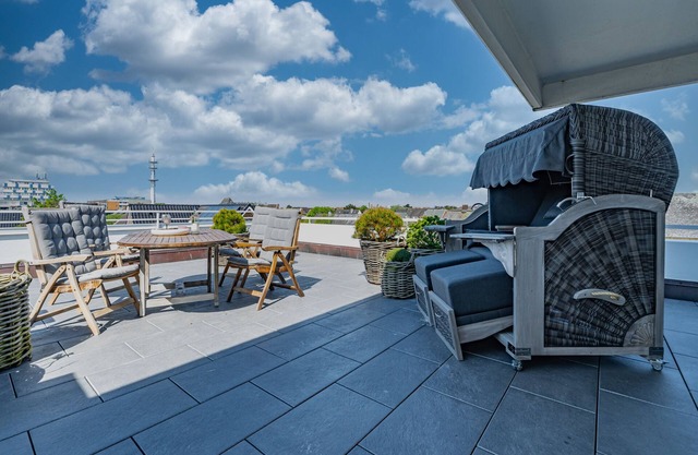 Modern vacation apartment with large roof terrace and private sauna in Westerland
