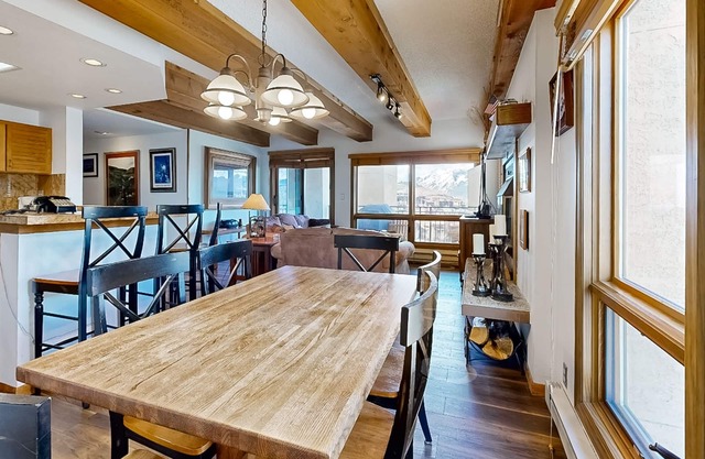 Mountain view condo with fireplace, hot tubs, sauna, & easy slope access