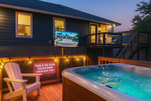 Neon Vibes Outdoor TV Hot Tub Arcade Room