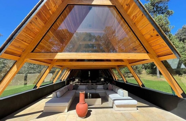 New and modern house surrounded by forest.