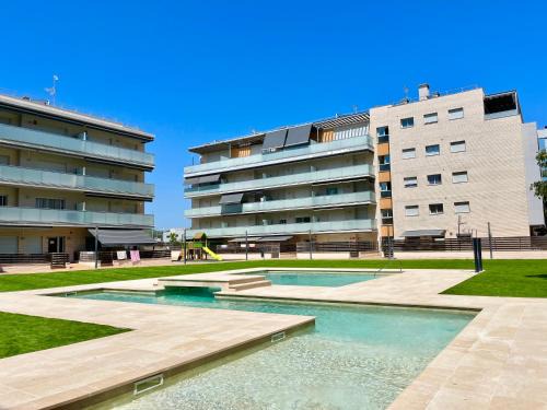 NEW! Apartamento con 2 piscinas, parque infantil, a 1 min de la playa