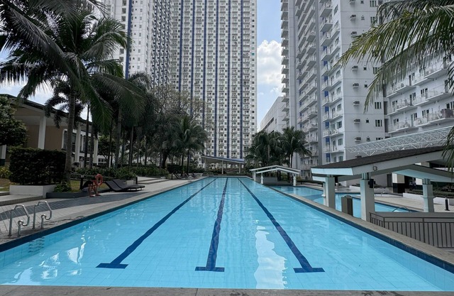 New GRASS residence condo near SM North EDSA modern, POOL, Home Away from Home
