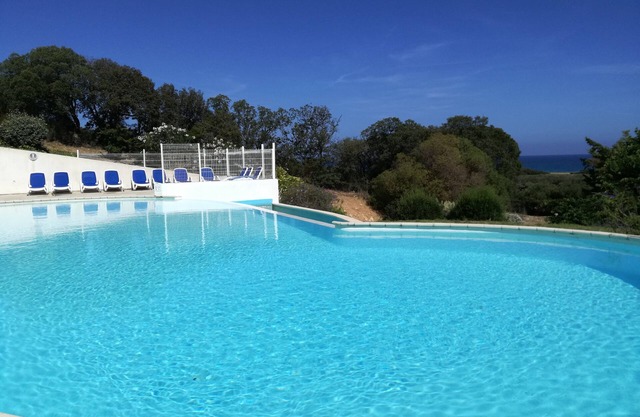 New house in a touristy 3 stars residence in front of the sea