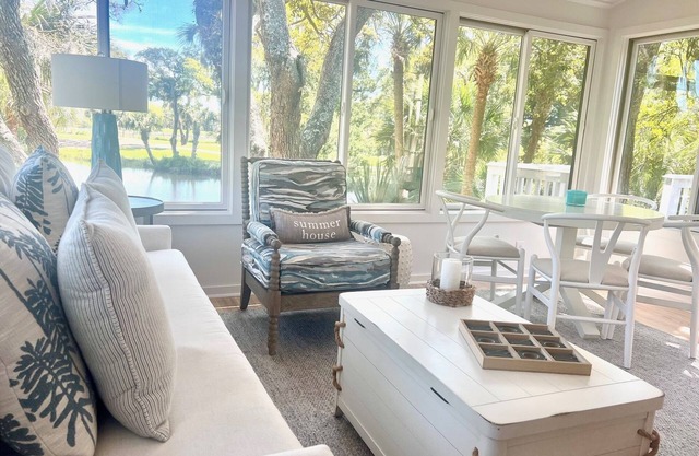 New to Market. Golf & pond views. Refined beach cottage.