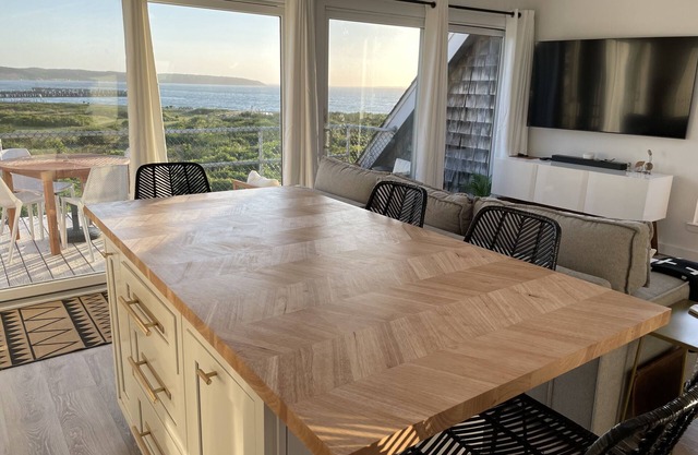 Newly renovated Waterfront condo with amazing views, private beach, pool & more