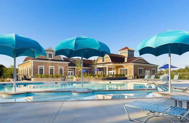 Ocean View Beach Club home with bay view, private tennis court & pool access