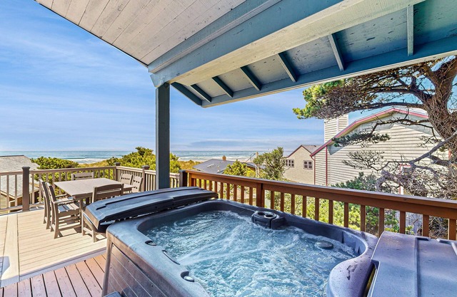 Ocean-view, dog-friendly home with private hot tub & deck - walk to the beach